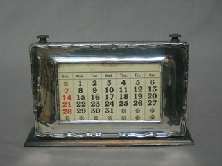 A silver cased perpetual desk calendar, Birmingham 1924