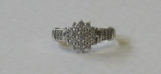A 9ct white gold cluster dress ring