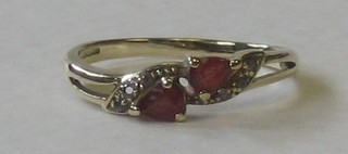 A 9ct gold dress ring set 2 ruby diamonds
