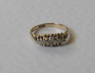 An 18ct gold dress ring set 5 diamonds