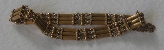 A gilt metal multi-link bracelet