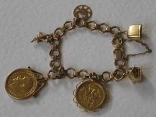 A 9ct gold charm bracelet hung an Edward VII 1910 half sovereign, a George V 1911 sovereign and 4 charms