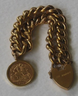 A 9ct gold hollow gold curb link bracelet hung a George V 1912 half sovereign