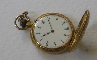 A lady's demi-hunter fob watch contained in an 18ct gold case