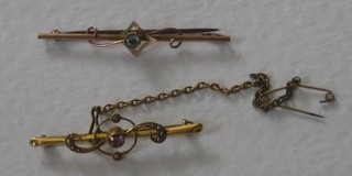 A gold bar brooch set amethysts and pearls and 1 other gold bar brooch set an aquamarine