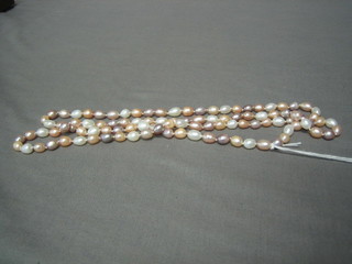 A rope of pastel fresh water pearls