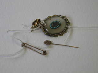 A pair of gold cufflinks (dented), a gold bar brooch, a stick pin, a pendant set a white stone and an agate and gilt metal brooch