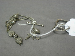 A silver Langtree watch chain and a pair of silver hoop earrings