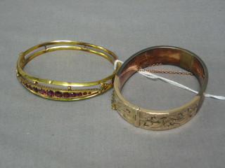 An Edwardian gilt metal bracelet set red stones and 1 other gilt metal bracelet
