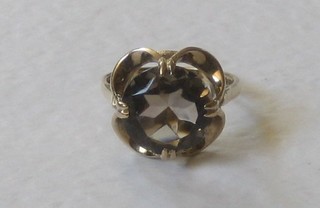 A 9ct gold dress ring set a smoky quartz