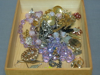 A collection of various items of costume jewellery