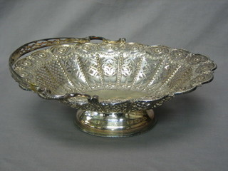 A Victorian oval pierced silver plated cake basket with swing handle by Mappin & Webb