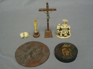 A 19th Century circular lacquered box the lid painted a Romantic scene 3", a crucifix and a small collection of curios