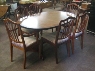 A modern mahogany dining suite comprising an oval extending dining table with 1 extra leaf, together with 6 dining chairs comprising 2 carvers, 4 standard