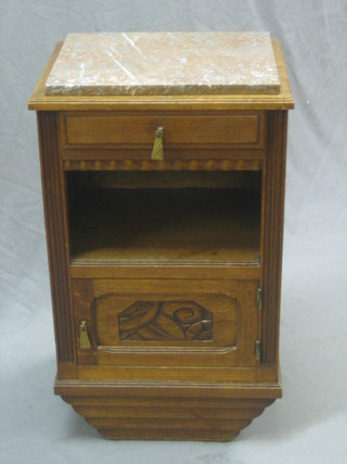 An Art Deco French oak bedside cabinet with veined marble top, fitted a drawer above a recess and cupboard 17"