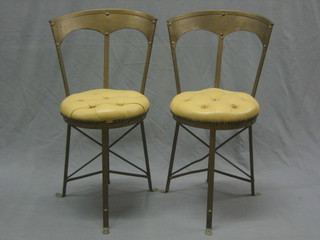 A pair of Art Nouveau gilt metal chairs with upholstered seats