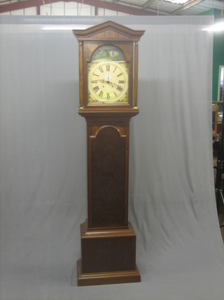 A 20th Century kit made longcase clock, the 13" painted dial with paper covering, striking on a bell and contained in a mahogany case 85"