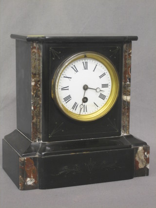 A Victorian 8 day mantel clock with enamelled dial and Roman numerals contained in a black marble case