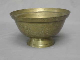 An Oriental engraved brass circular bowl 10"