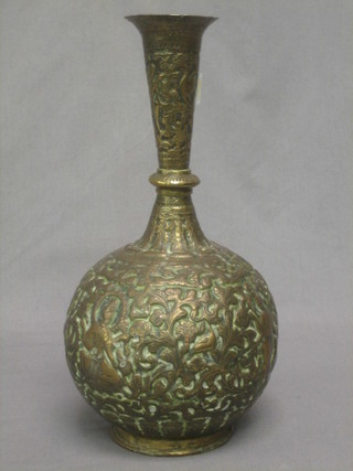 An Eastern embossed brass club shaped vase 12"
