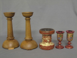 A pair of turned wooden candlesticks 8", a pricket candlestick 4" and 2 Eastern painted candlesticks 4"
