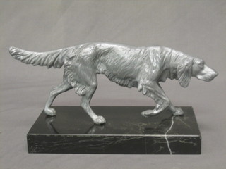 An Art Deco style grey painted figure of a walking Setter, raised on a marble base 9"