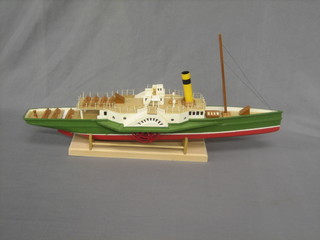 A wooden battery operated model of a paddle steamer 24"