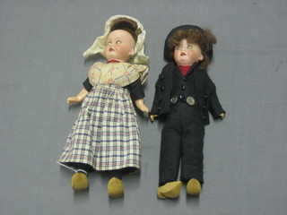 2 German biscuit porcelain headed costume dolls, the heads marked German 3902/0Y