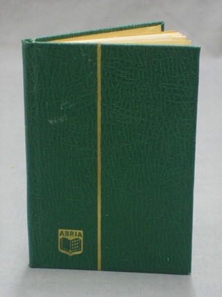 A small green stock book containing Victorian 2d and other stamps etc