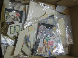 A collection of loose stamps from Thailand, France Switzerland, Hungary etc