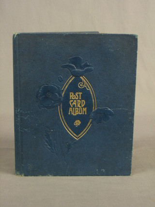 A blue paper postcard album containing approx. 115 black and white postcards of Steam Locomotives