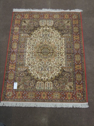 A contemporary tan ground Belgian cotton style rug 66" x 50"