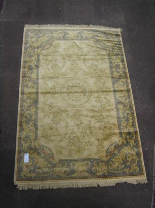 A contemporary gold coloured Aubusson style rug 89" x 60"