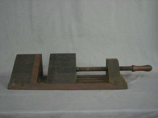 A wooden carpenter's donkey vice 24"