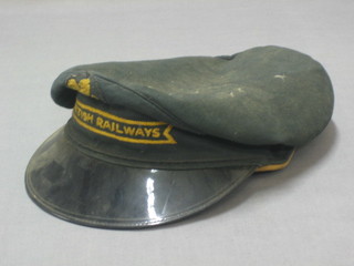 A green cloth British Railway's porter's cap by Sanders & Brightman