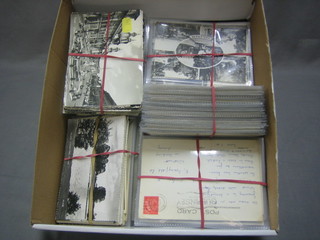 A collection of various black and white and other postcards