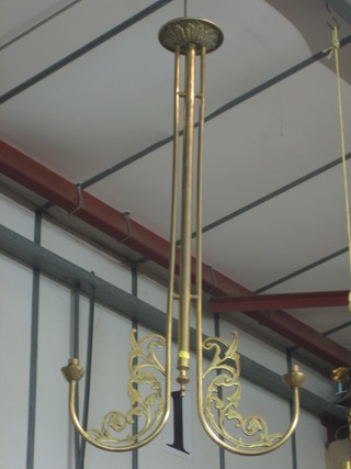 A pair of brass hanging twin light electroliers