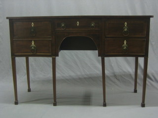 A Georgian style mahogany sideboard of serpentine outline fitted 1 long drawer, flanked by 4 short drawers, raised on square tapering supports ending in spade feet 53"
