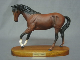 A Royal Doulton figure of a walking bay horse - Spirit of Youth 7"