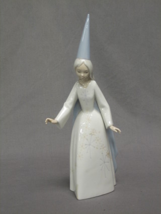 A Lladro figure of a standing lady with colourful hat 11"