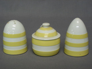 A yellow and white striped 3 piece T G Greener Cornish Kitchenware condiment set with salt, pepper and mustard pot, the base with green shield mark (chip to mustard lid)
