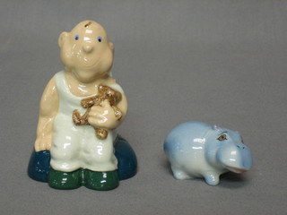 A Wade 1998 figure of a baby 3 1/2" and a Wade figure of a Hippopotamus 2"