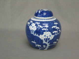 A blue and white Prunus ginger jar 8"
