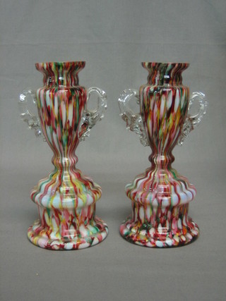 A pair of End of Day twin handled glass vases, raised on circular bases 7"
