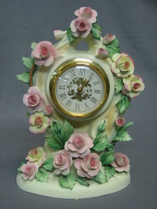 A Capo di Monte Rose and Romance porcelain cased clock 10"