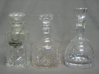 3 various cut glass decanters and stoppers