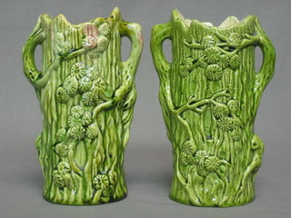 A pair of Victorian Ault pottery vases in the form of ivy clad tree trunks 7"