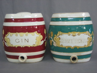 2 19th Century red and white pottery spirit barrels, 1 marked Gin (cracked)