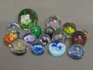 4 Caithness paperweights - Moon Crystal, Pastel, Millefiori Flower and Petunias, an Adrian Sankey paperweight and 11 others