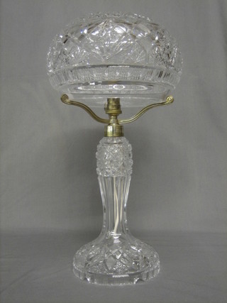 A circular cut glass table lamp 10"